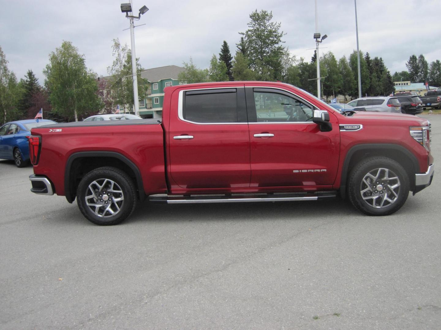 2023 red /black GMC Sierra 1500 SLT Crew Cab 4WD (3GTUUDED9PG) with an 5.3L V8 OHV 16V engine, 6A transmission, located at 9530 Old Seward Highway, Anchorage, AK, 99515, (907) 349-3343, 61.134140, -149.865570 - Nice 2023 GMC Sierra 1500 SLT with X31-OFF ROAD package - Photo#3