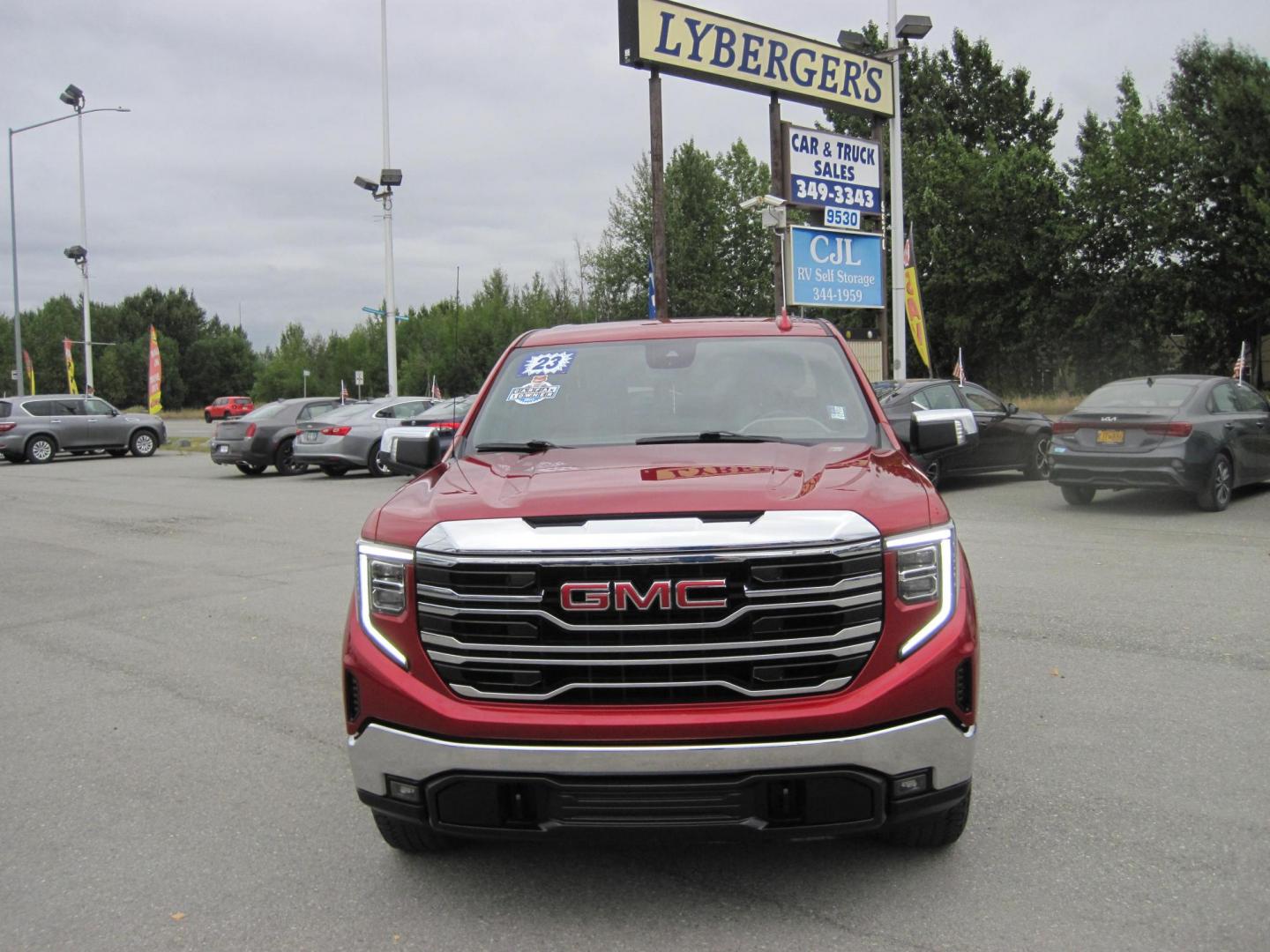2023 red /black GMC Sierra 1500 SLT Crew Cab 4WD (3GTUUDED9PG) with an 5.3L V8 OHV 16V engine, 6A transmission, located at 9530 Old Seward Highway, Anchorage, AK, 99515, (907) 349-3343, 61.134140, -149.865570 - Nice 2023 GMC Sierra 1500 SLT with X31-OFF ROAD package - Photo#2