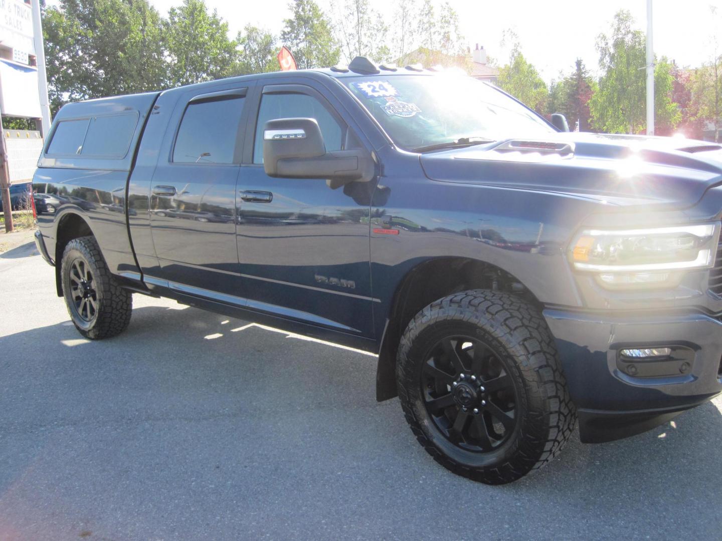 2024 blue /black RAM 3500 Laramie Mega Cab 4WD (3C63R3ML5RG) with an 6.7L L6 OHV 24V TURBO DIESEL engine, 6A transmission, located at 9530 Old Seward Highway, Anchorage, AK, 99515, (907) 349-3343, 61.134140, -149.865570 - Loaded 2024 Ram 3500 Laramie mega cab come take a test drive - Photo#3