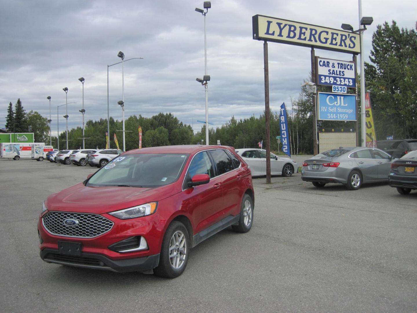 2024 red /black Ford Edge SEL (2FMPK4J90RB) with an 2.0L L4 DOHC 16V engine, 6A transmission, located at 9530 Old Seward Highway, Anchorage, AK, 99515, (907) 349-3343, 61.134140, -149.865570 - Nice 2024 Ford Edge SEL, come take a test drive - Photo#1