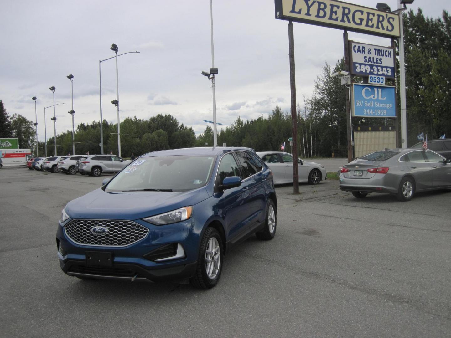 2024 blue /black Ford Edge SEL (2FMPK4J95RB) with an 2.0L L4 DOHC 16V engine, 6A transmission, located at 9530 Old Seward Highway, Anchorage, AK, 99515, (907) 349-3343, 61.134140, -149.865570 - Nice 2024 Ford Edge SEL come take a test drive - Photo#1