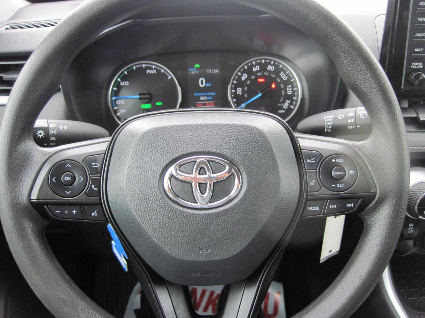 2022 silver /black Toyota RAV4 Hybrid LE (4T3MWRFV8NU) with an 2.5L L4 DOHC 16V HYBRID engine, CVT transmission, located at 9530 Old Seward Highway, Anchorage, AK, 99515, (907) 349-3343, 61.134140, -149.865570 - Low Miles on this 2022 Toyota Rav4 Hybrid LE come take a test drive - Photo#13