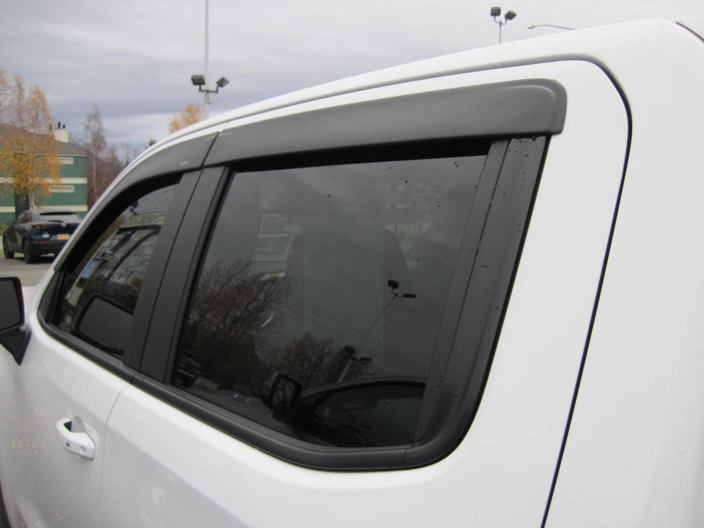 2021 white /black Chevrolet Silverado 1500 RST Crew Cab 4WD (3GCUYEEL3MG) with an 6.2L V8 OHV 16V engine, 6A transmission, located at 9530 Old Seward Highway, Anchorage, AK, 99515, (907) 349-3343, 61.134140, -149.865570 - Low Miles on this 2021 Chevrolet Silverado 1500 come take a test drive. - Photo#20