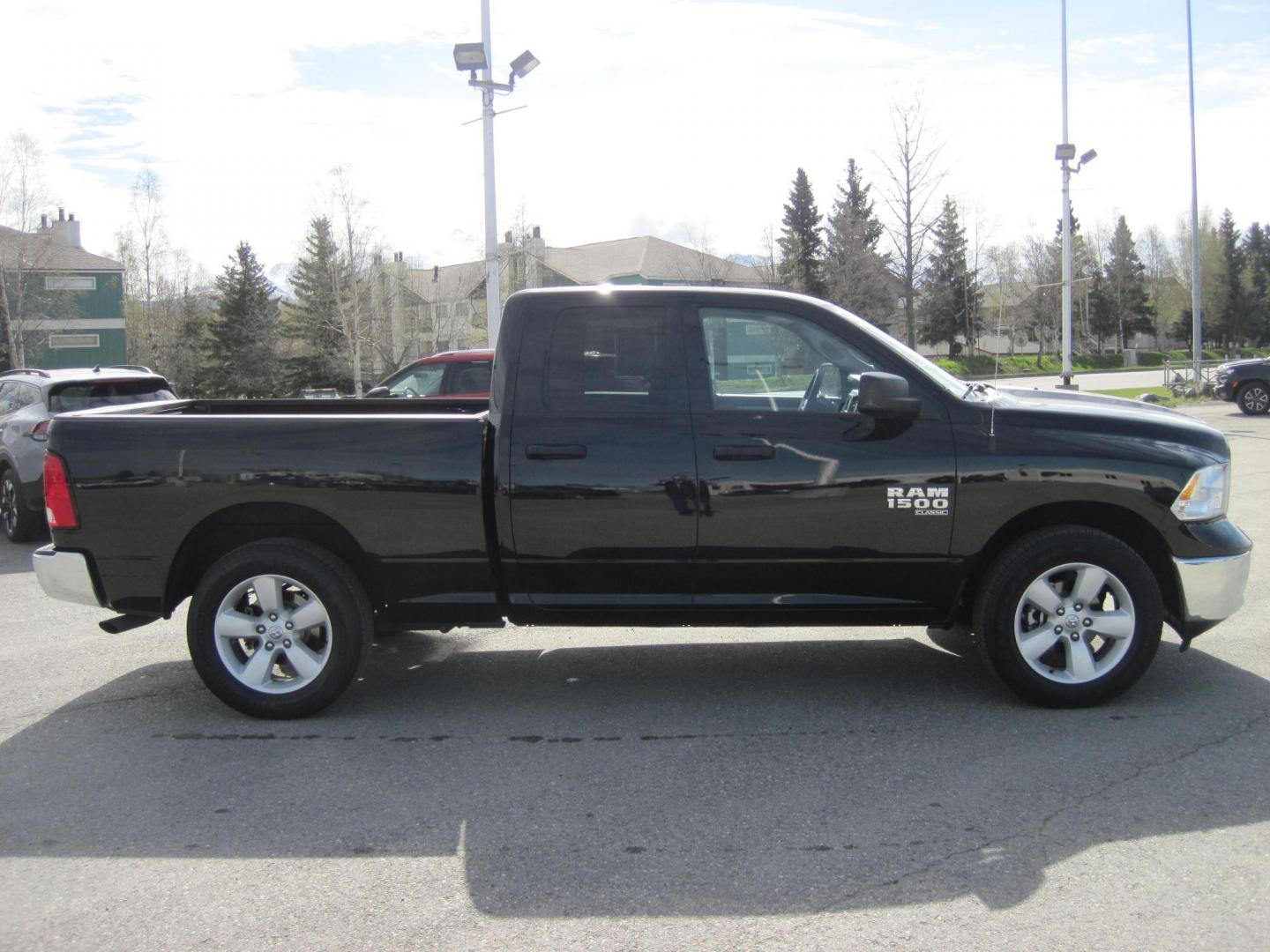2024 black /black RAM 1500 SLT Quad Cab 4WD (1C6RR7GGXRS) with an 3.6L V6 DOHC 24V FFV engine, 8A transmission, located at 9530 Old Seward Highway, Anchorage, AK, 99515, (907) 349-3343, 61.134140, -149.865570 - Nice Ram Club Cab SLT come take a test drive - Photo#2