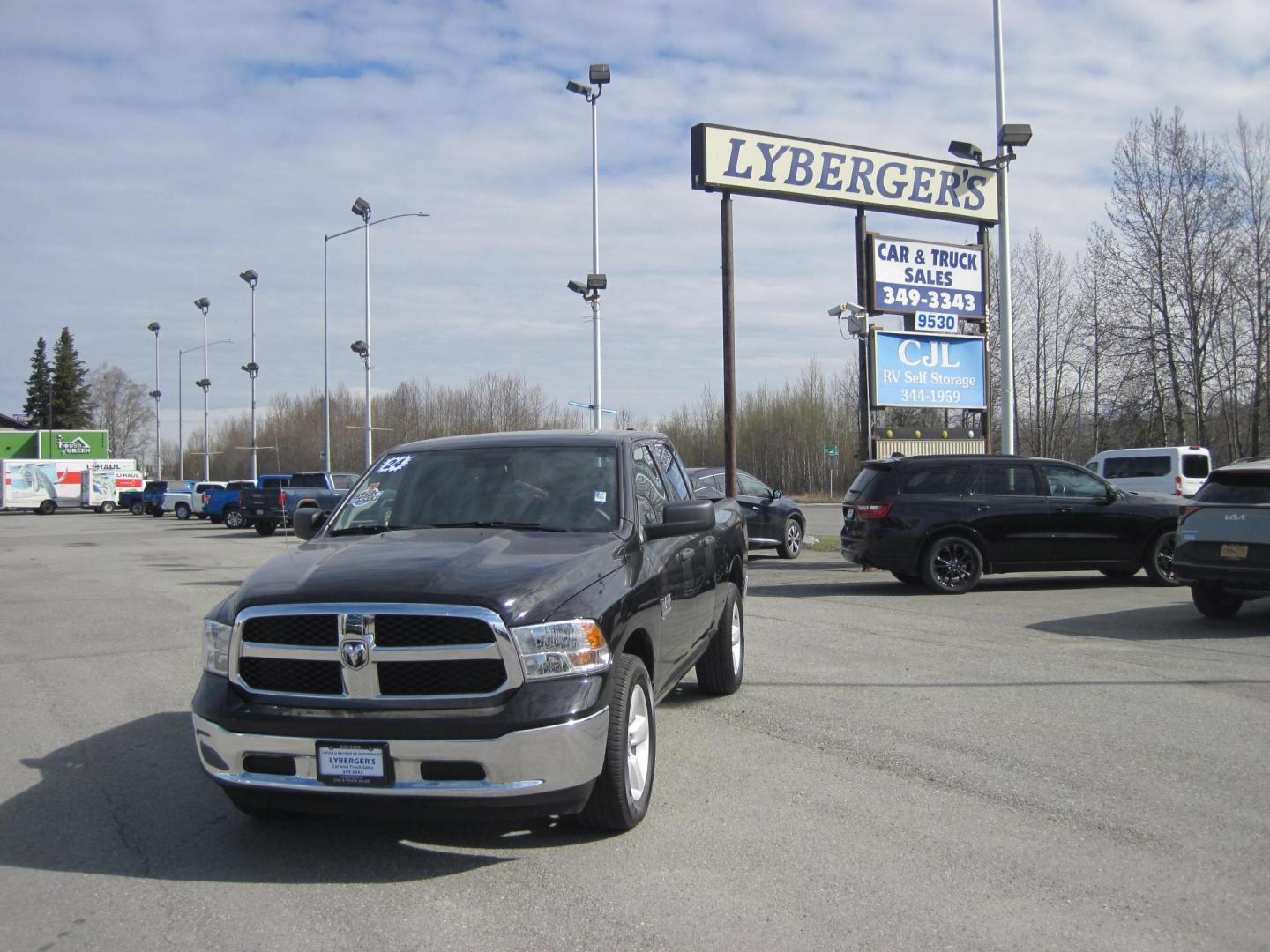 2024 black /black RAM 1500 SLT Quad Cab 4WD (1C6RR7GGXRS) with an 3.6L V6 DOHC 24V FFV engine, 8A transmission, located at 9530 Old Seward Highway, Anchorage, AK, 99515, (907) 349-3343, 61.134140, -149.865570 - Nice Ram Club Cab SLT come take a test drive - Photo#0