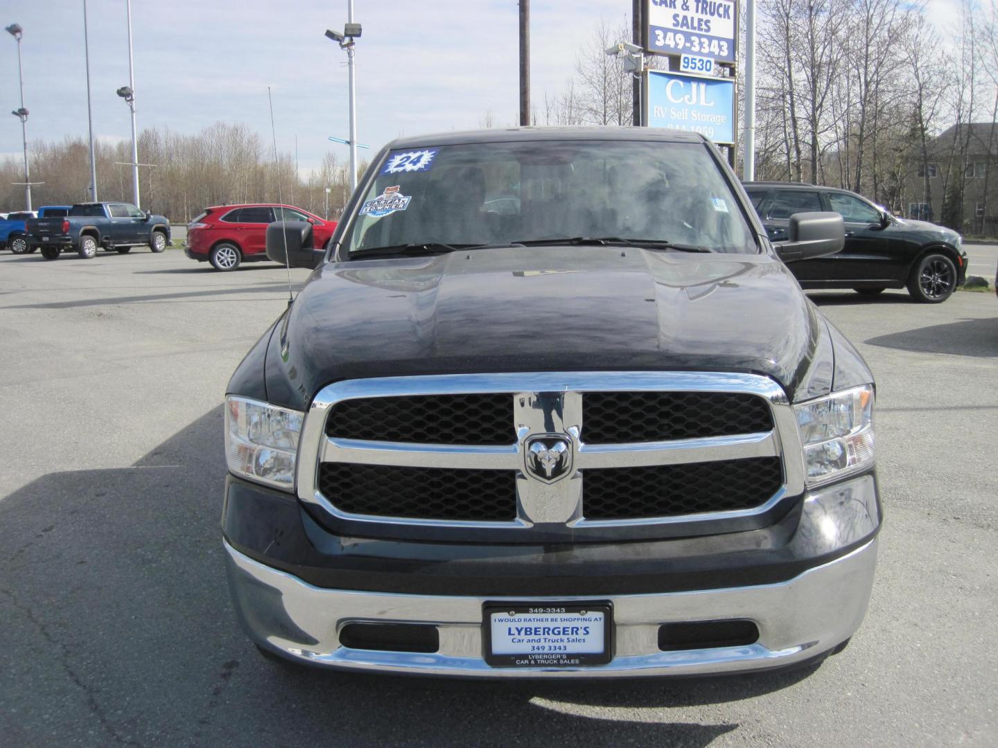 2024 black /black RAM 1500 SLT Quad Cab 4WD (1C6RR7GGXRS) with an 3.6L V6 DOHC 24V FFV engine, 8A transmission, located at 9530 Old Seward Highway, Anchorage, AK, 99515, (907) 349-3343, 61.134140, -149.865570 - Nice Ram Club Cab SLT come take a test drive - Photo#1