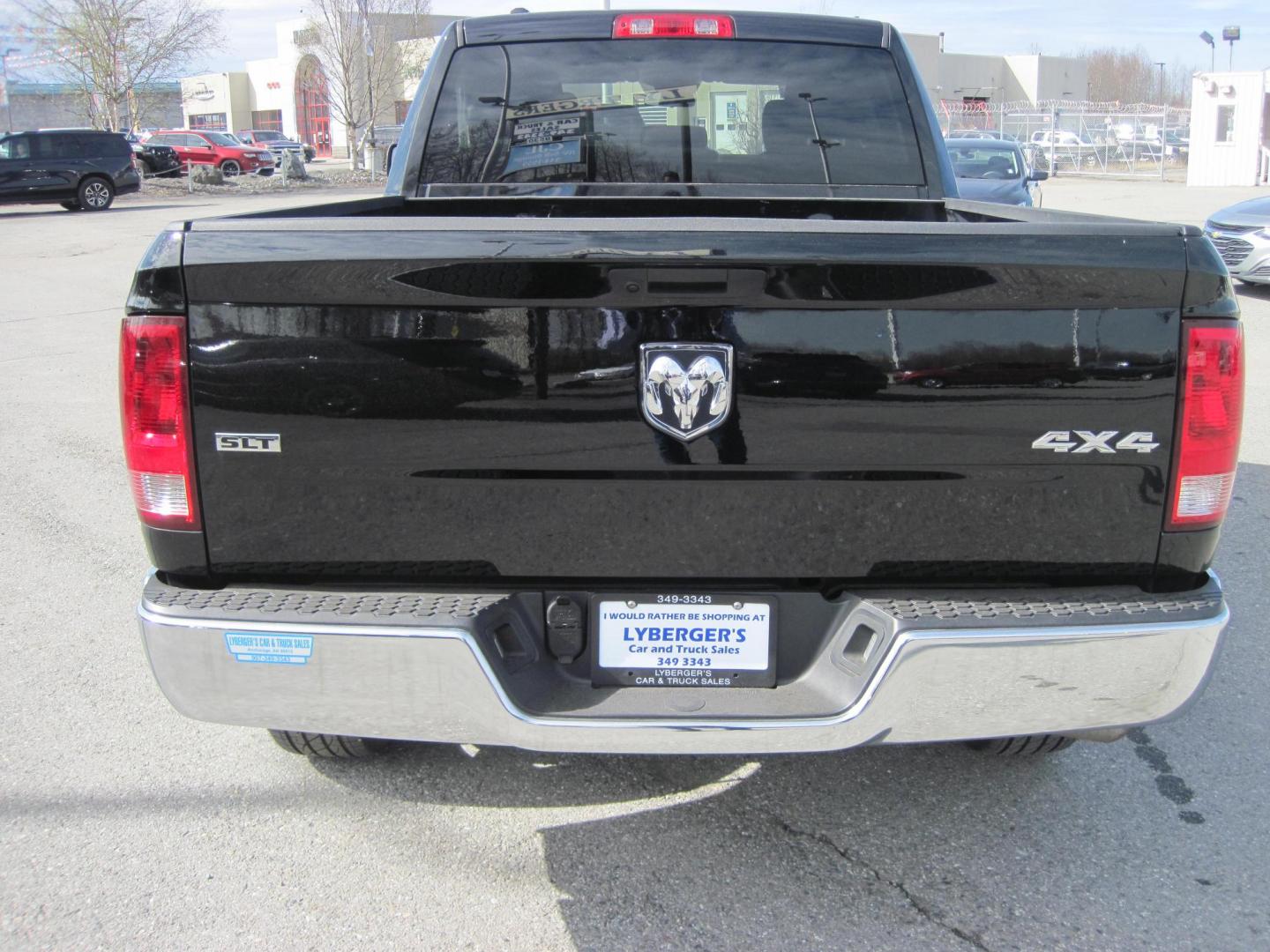 2024 black /black RAM 1500 SLT Quad Cab 4WD (1C6RR7GGXRS) with an 3.6L V6 DOHC 24V FFV engine, 8A transmission, located at 9530 Old Seward Highway, Anchorage, AK, 99515, (907) 349-3343, 61.134140, -149.865570 - Nice Ram Club Cab SLT come take a test drive - Photo#3