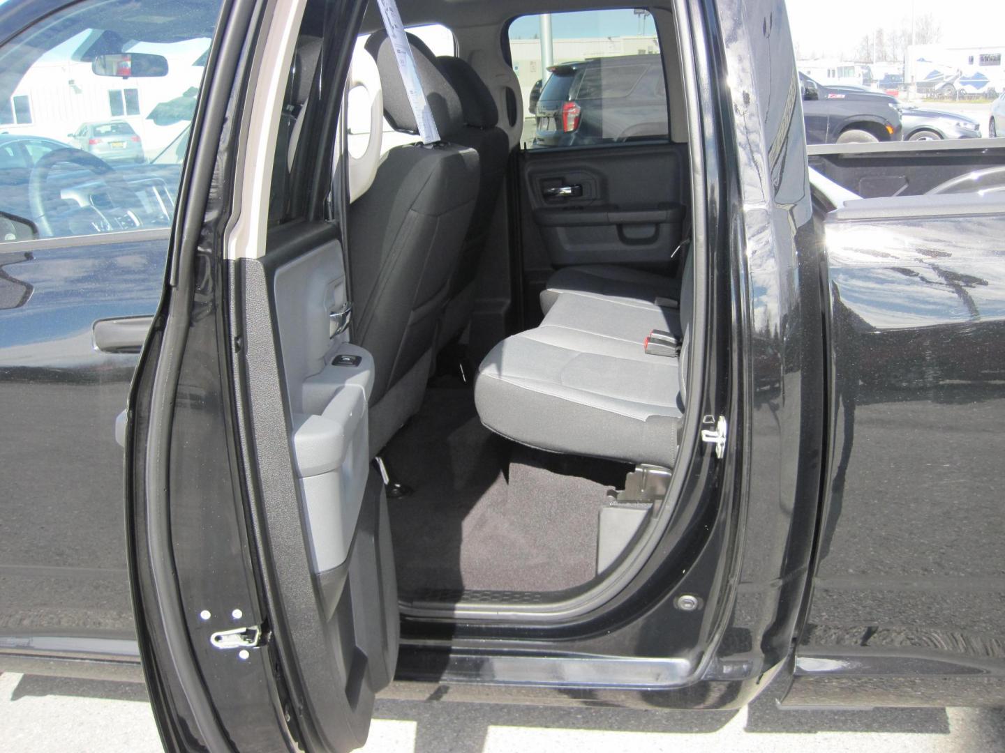 2024 black /black RAM 1500 SLT Quad Cab 4WD (1C6RR7GGXRS) with an 3.6L V6 DOHC 24V FFV engine, 8A transmission, located at 9530 Old Seward Highway, Anchorage, AK, 99515, (907) 349-3343, 61.134140, -149.865570 - Nice Ram Club Cab SLT come take a test drive - Photo#9