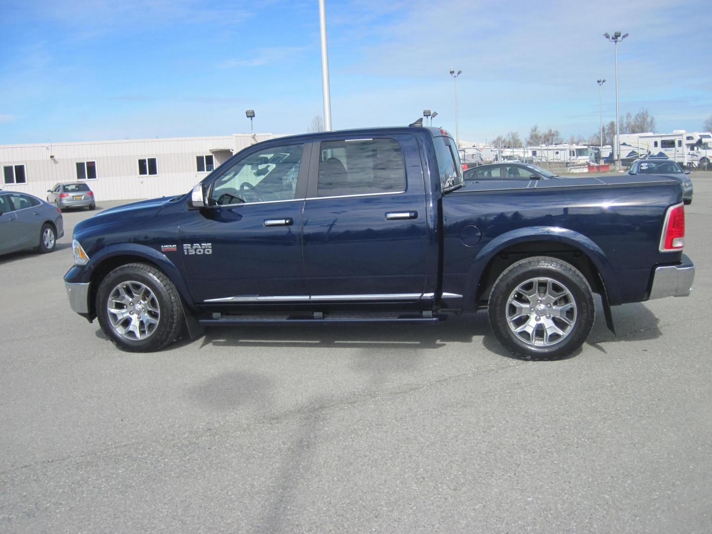 2017 blue /black RAM 1500 Limited Crew Cab 4WD (1C6RR7PT9HS) with an 5.7L V8 OHV 16V engine, 8A transmission, located at 9530 Old Seward Highway, Anchorage, AK, 99515, (907) 349-3343, 61.134140, -149.865570 - Loaded 2017 Ram 1500 Limited come take a test drive - Photo#4