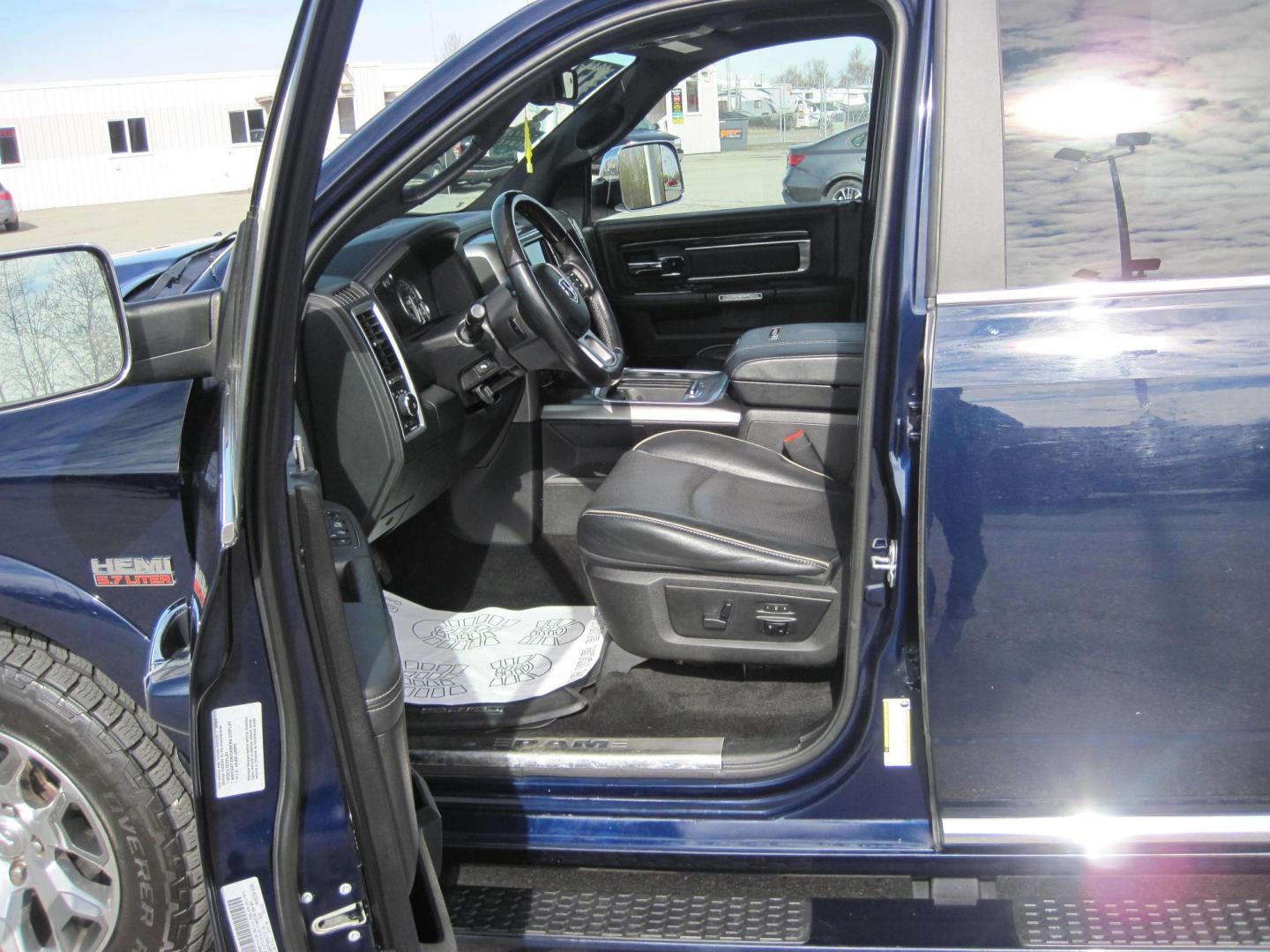 2017 blue /black RAM 1500 Limited Crew Cab 4WD (1C6RR7PT9HS) with an 5.7L V8 OHV 16V engine, 8A transmission, located at 9530 Old Seward Highway, Anchorage, AK, 99515, (907) 349-3343, 61.134140, -149.865570 - Loaded 2017 Ram 1500 Limited come take a test drive - Photo#16