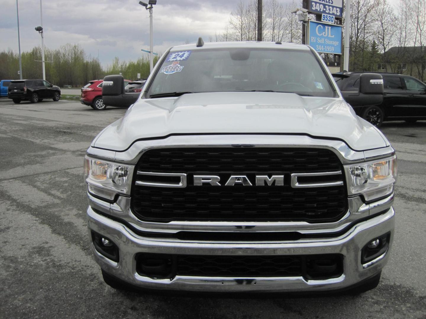 2024 white /gray RAM 3500 Big Horn Crew Cab LWB 4WD (3C63R3HL6RG) with an 6.7L L6 OHV 24V TURBO DIESEL engine, 6A transmission, located at 9530 Old Seward Highway, Anchorage, AK, 99515, (907) 349-3343, 61.134140, -149.865570 - Nice 2024 Ram 3500 Big Horn Long box diesel come take a test drive - Photo#2