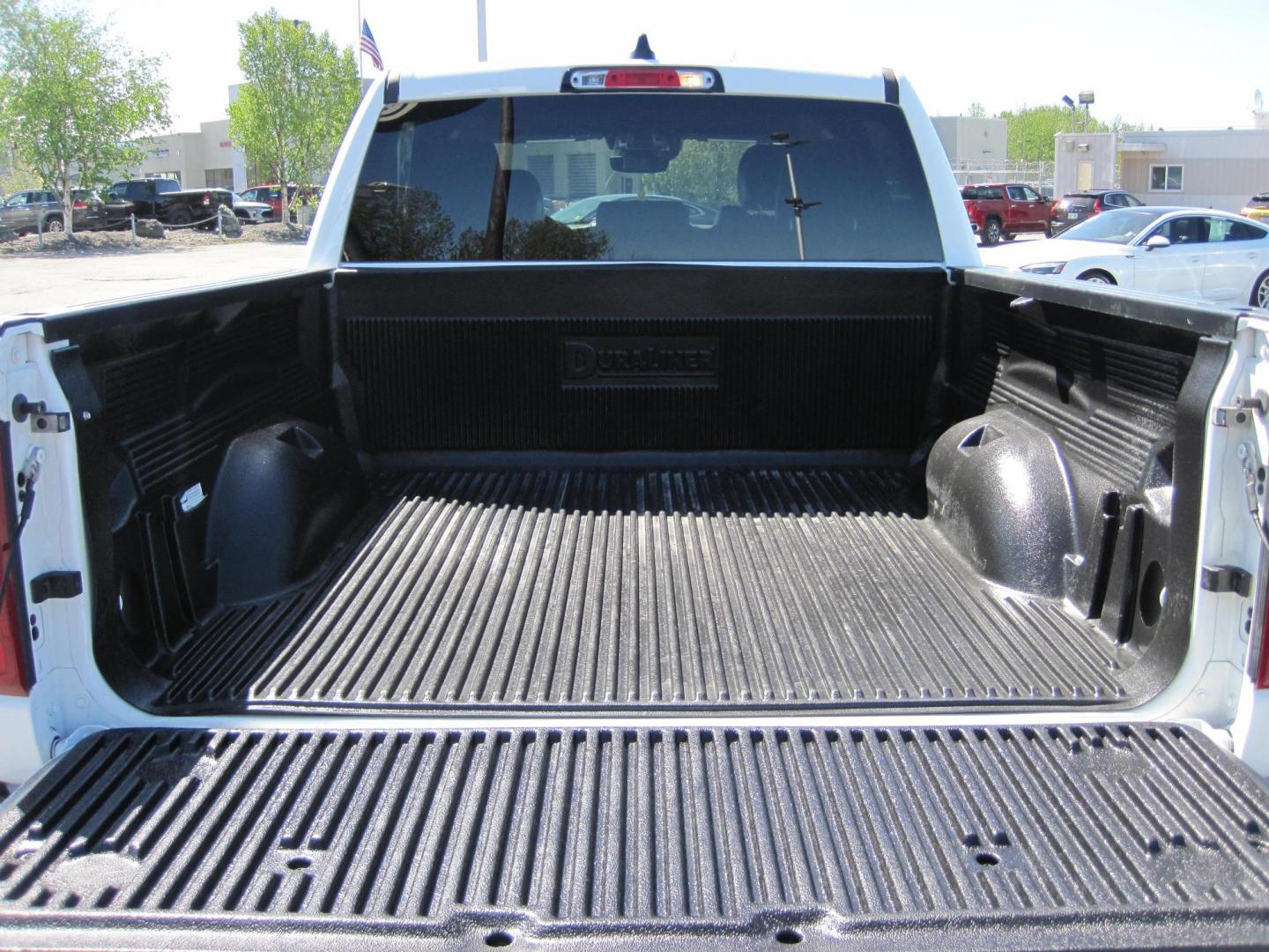 2024 white /black RAM 1500 Laramie Crew Cab SWB 4WD (1C6SRFJT5RN) with an 5.7L V8 OHV 16V engine, 8A transmission, located at 9530 Old Seward Highway, Anchorage, AK, 99515, (907) 349-3343, 61.134140, -149.865570 - Nice 2024 Ram 1500 Laramie 4x4 come take a test drive - Photo#6