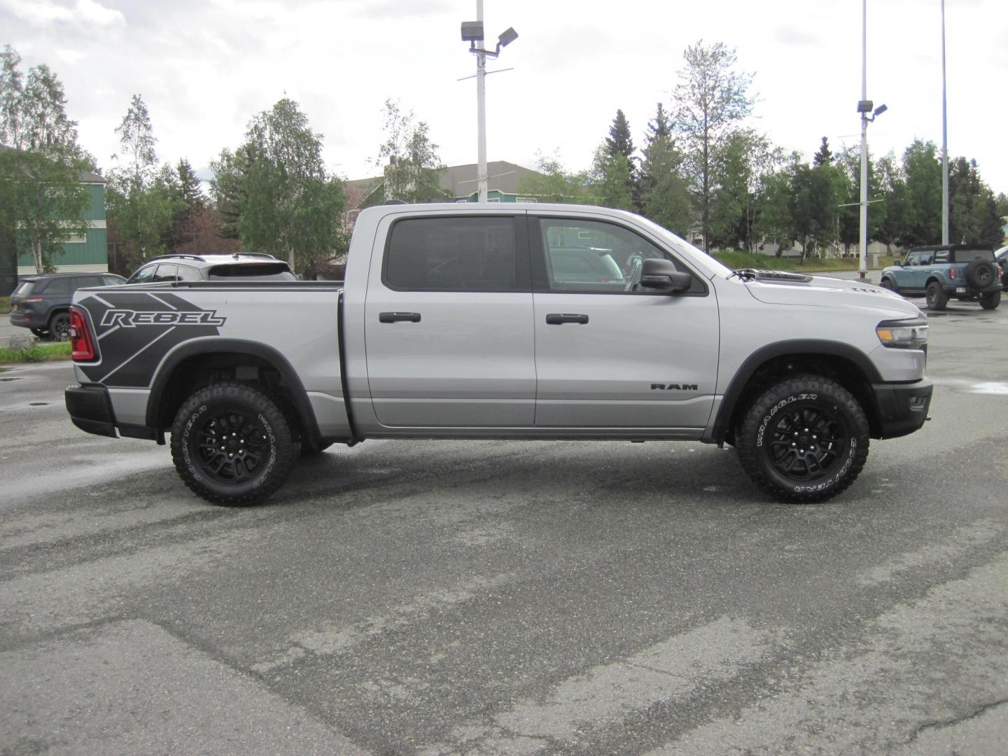 2025 silver /black RAM 1500 Rebel Crew Cab SB 4WD (1C6SRFLPXSN) with an 3.0L V6 DOHC 24V TURBO engine, automatic transmission, located at 9530 Old Seward Highway, Anchorage, AK, 99515, (907) 349-3343, 61.134140, -149.865570 - 2025 Ram 1500 Rebel, 4wd come take a test drive.- Photo#4