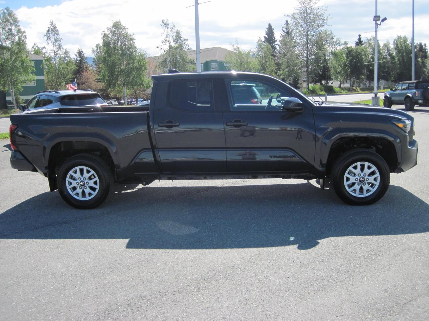 2024 gray /black Toyota Tacoma Double Cab 4WD (3TMLB5JN4RM) with an 2.4L L4 DOHC 16V engine, 6A transmission, located at 9530 Old Seward Highway, Anchorage, AK, 99515, (907) 349-3343, 61.134140, -149.865570 - LOW MILES ON THIS 2024 TOYOTAT TACOMA DOUBLE CAB, COME TAKE A TEST DRIVE- Photo#3