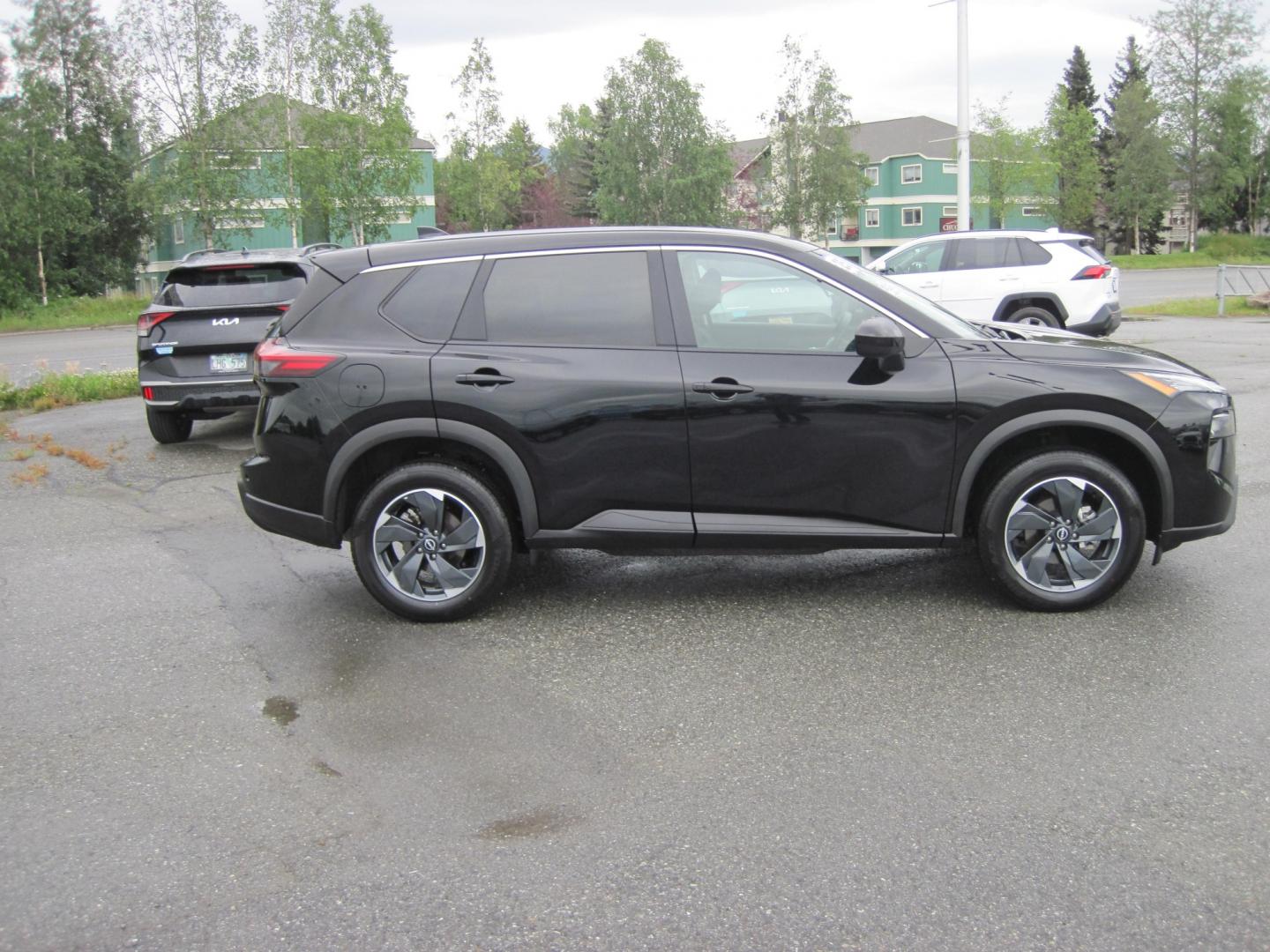 2025 black /black Nissan Rogue SV AWD (5N1BT3BB6SC) with an 2.5L L4 DOHC 16V engine, CVT transmission, located at 9530 Old Seward Highway, Anchorage, AK, 99515, (907) 349-3343, 61.134140, -149.865570- Photo#3
