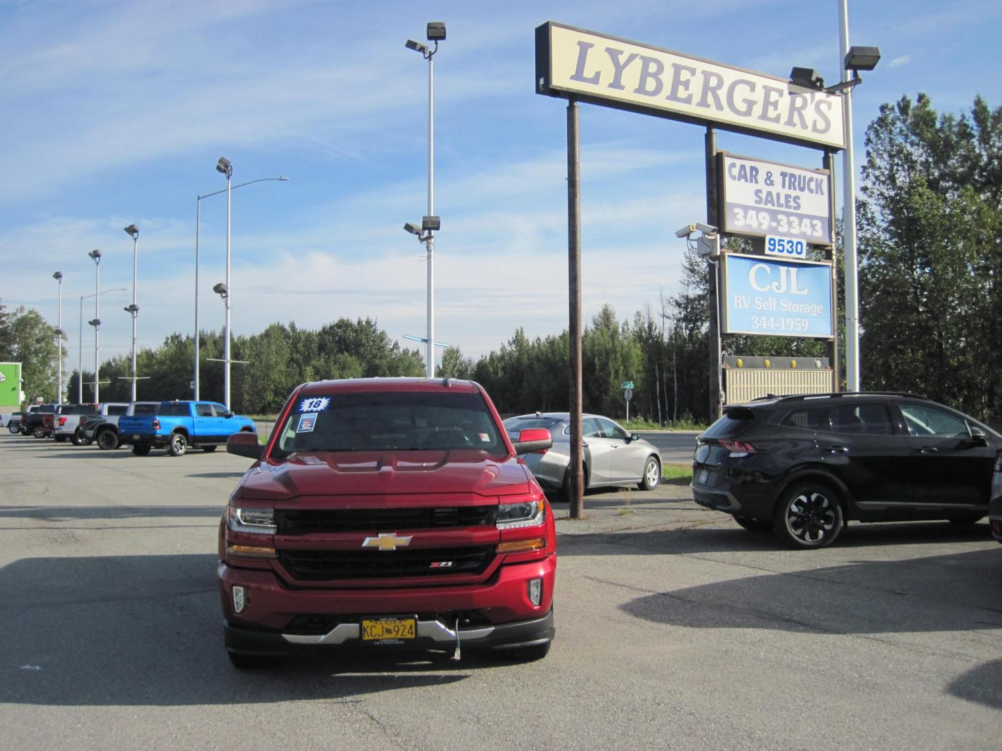 2018 RED /gray Chevrolet Silverado 1500 LT Crew Cab 4WD (3GCUKREC4JG) with an 5.3L V8 OHV 16V engine, 6A transmission, located at 9530 Old Seward Highway, Anchorage, AK, 99515, (907) 349-3343, 61.134140, -149.865570 - Low Miles on this 2018 Chevrolet Silverado Z71 Lt come take a test drive- Photo#0