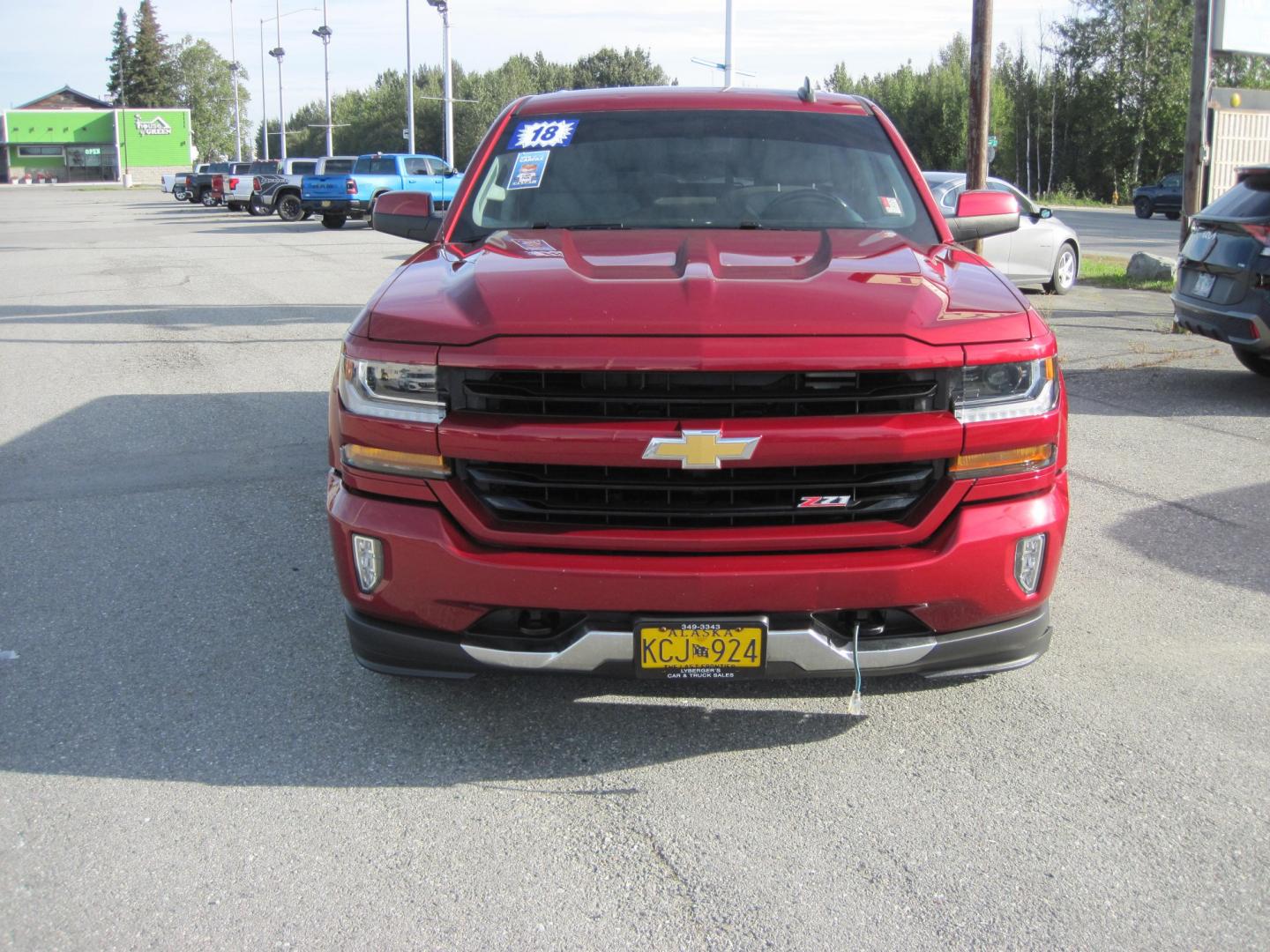 2018 RED /gray Chevrolet Silverado 1500 LT Crew Cab 4WD (3GCUKREC4JG) with an 5.3L V8 OHV 16V engine, 6A transmission, located at 9530 Old Seward Highway, Anchorage, AK, 99515, (907) 349-3343, 61.134140, -149.865570 - Low Miles on this 2018 Chevrolet Silverado Z71 Lt come take a test drive- Photo#2