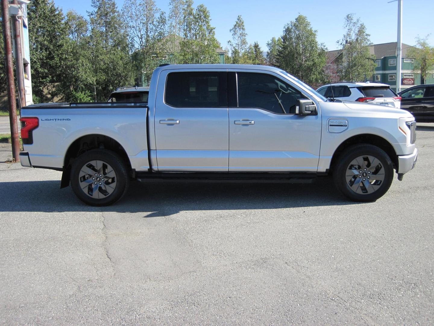 2023 silver /gray Ford F-150 Lightning Pro (1FTVW1EVXPW) with an ELECTRIC engine, AUTOMATIC transmission, located at 9530 Old Seward Highway, Anchorage, AK, 99515, (907) 349-3343, 61.134140, -149.865570 - LOW MILES ON THIS 2023 FORD F150 XLT LIGHTING COME TAKE A TEST DRIVE- Photo#9