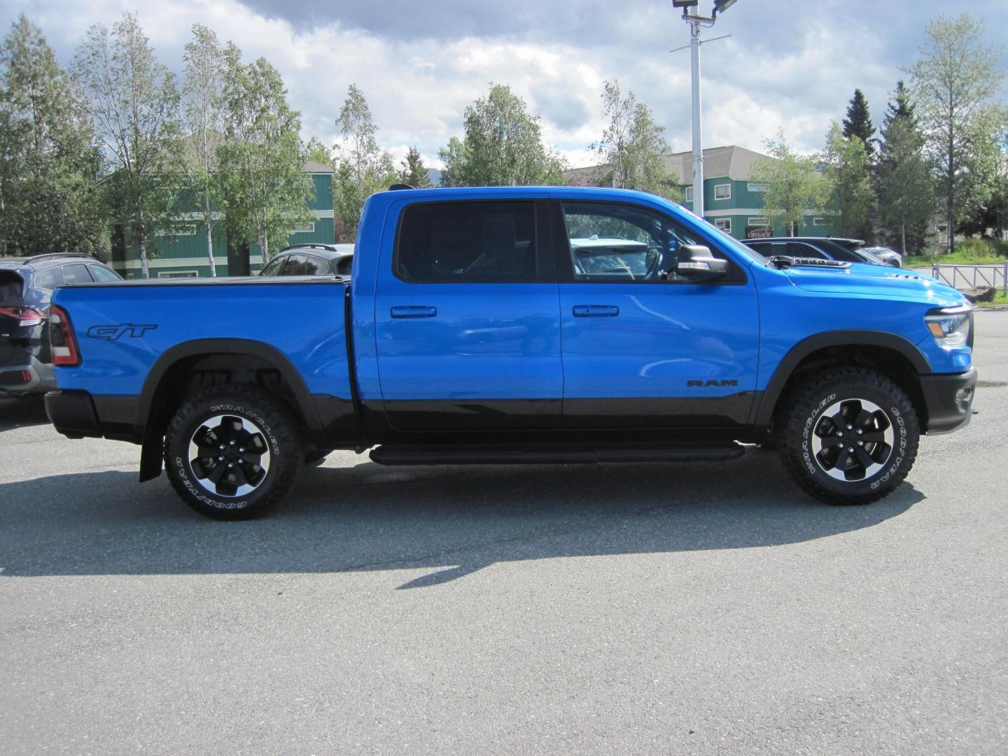 2022 blue /black RAM 1500 Rebel Crew Cab SB 4WD (1C6SRFLT2NN) with an 5.7L V8 OHV 16V engine, 8A transmission, located at 9530 Old Seward Highway, Anchorage, AK, 99515, (907) 349-3343, 61.134140, -149.865570 - LOADED 2022 RAM 1500 REBEL WITH LOTS OF EXTRAS COME TAKE A TEST DRIVE- Photo#2