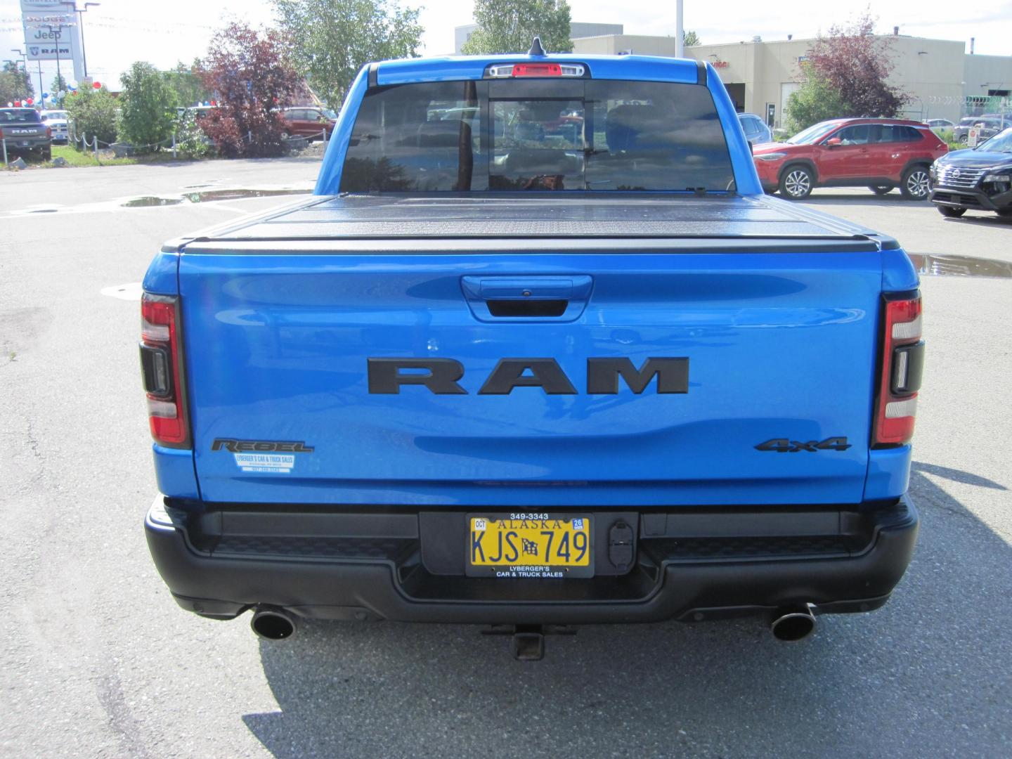 2022 blue /black RAM 1500 Rebel Crew Cab SB 4WD (1C6SRFLT2NN) with an 5.7L V8 OHV 16V engine, 8A transmission, located at 9530 Old Seward Highway, Anchorage, AK, 99515, (907) 349-3343, 61.134140, -149.865570 - LOADED 2022 RAM 1500 REBEL WITH LOTS OF EXTRAS COME TAKE A TEST DRIVE- Photo#3