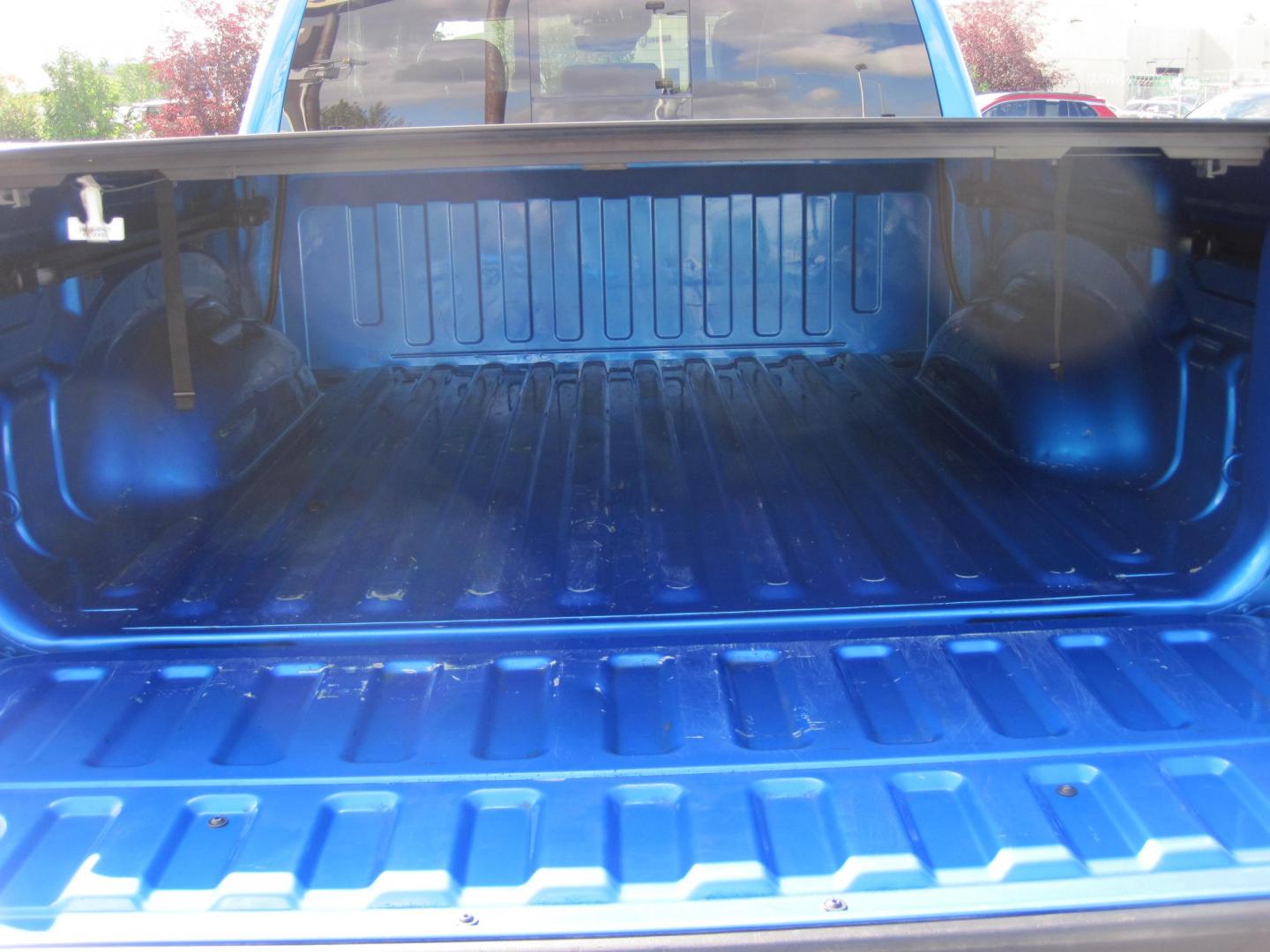 2022 blue /black RAM 1500 Rebel Crew Cab SB 4WD (1C6SRFLT2NN) with an 5.7L V8 OHV 16V engine, 8A transmission, located at 9530 Old Seward Highway, Anchorage, AK, 99515, (907) 349-3343, 61.134140, -149.865570 - LOADED 2022 RAM 1500 REBEL WITH LOTS OF EXTRAS COME TAKE A TEST DRIVE- Photo#4