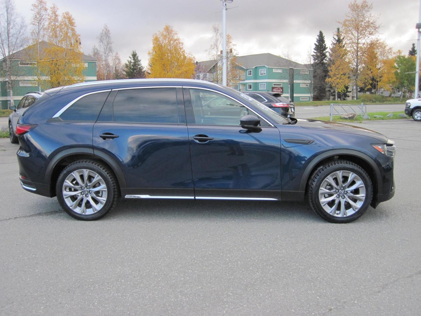 2024 blue /BLACK Mazda CX-90 Premium (JM3KKDHD6R1) with an 3.3L V6 DOHC 24V HYBRID engine, 8A transmission, located at 9530 Old Seward Highway, Anchorage, AK, 99515, (907) 349-3343, 61.134140, -149.865570 - NICE 2024 MAZDA CX-90 PREMIUM AWD COME TAKE A TEST DRIVE- Photo#3
