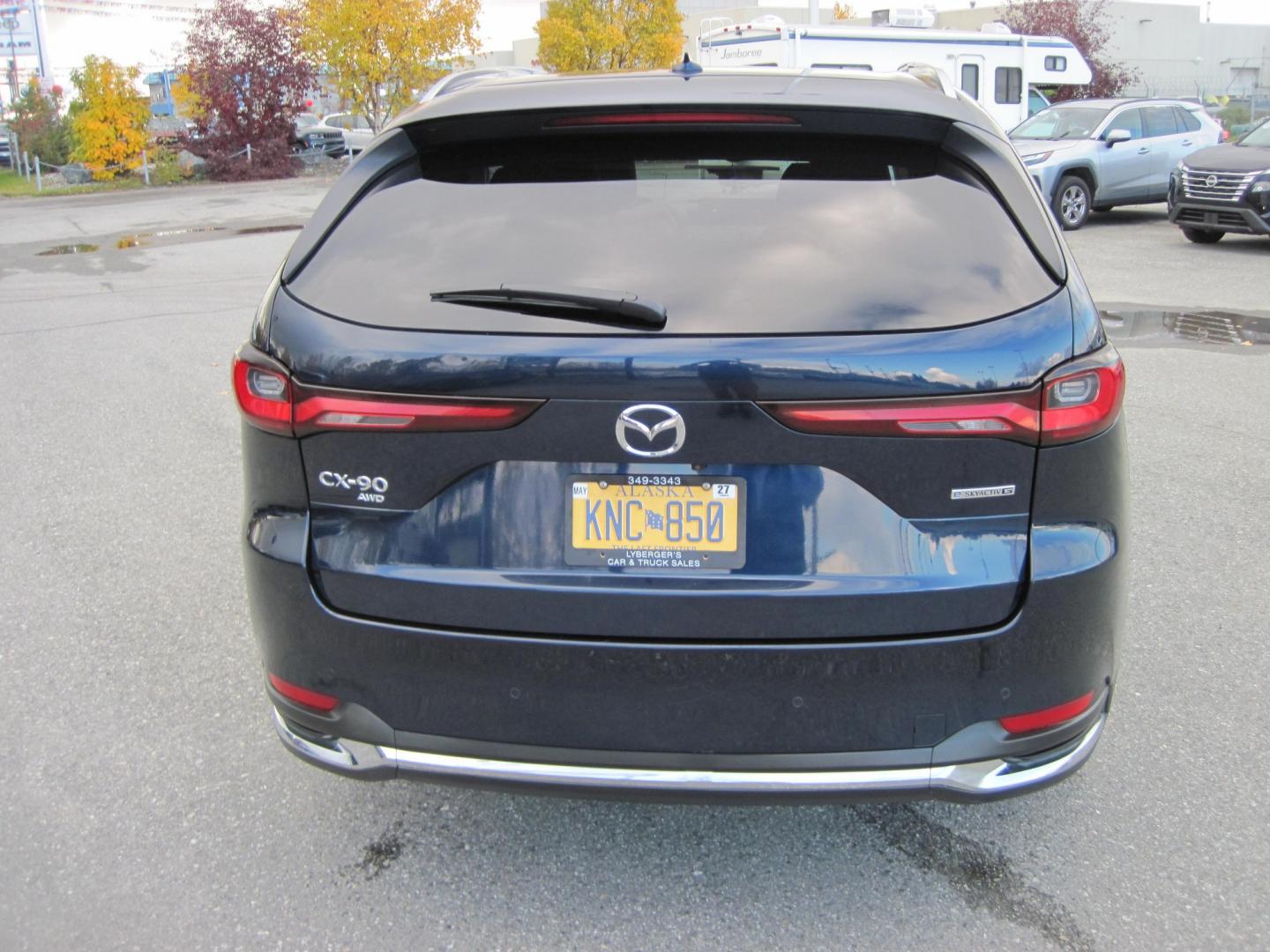 2024 blue /BLACK Mazda CX-90 Premium (JM3KKDHD6R1) with an 3.3L V6 DOHC 24V HYBRID engine, 8A transmission, located at 9530 Old Seward Highway, Anchorage, AK, 99515, (907) 349-3343, 61.134140, -149.865570 - NICE 2024 MAZDA CX-90 PREMIUM AWD COME TAKE A TEST DRIVE- Photo#4