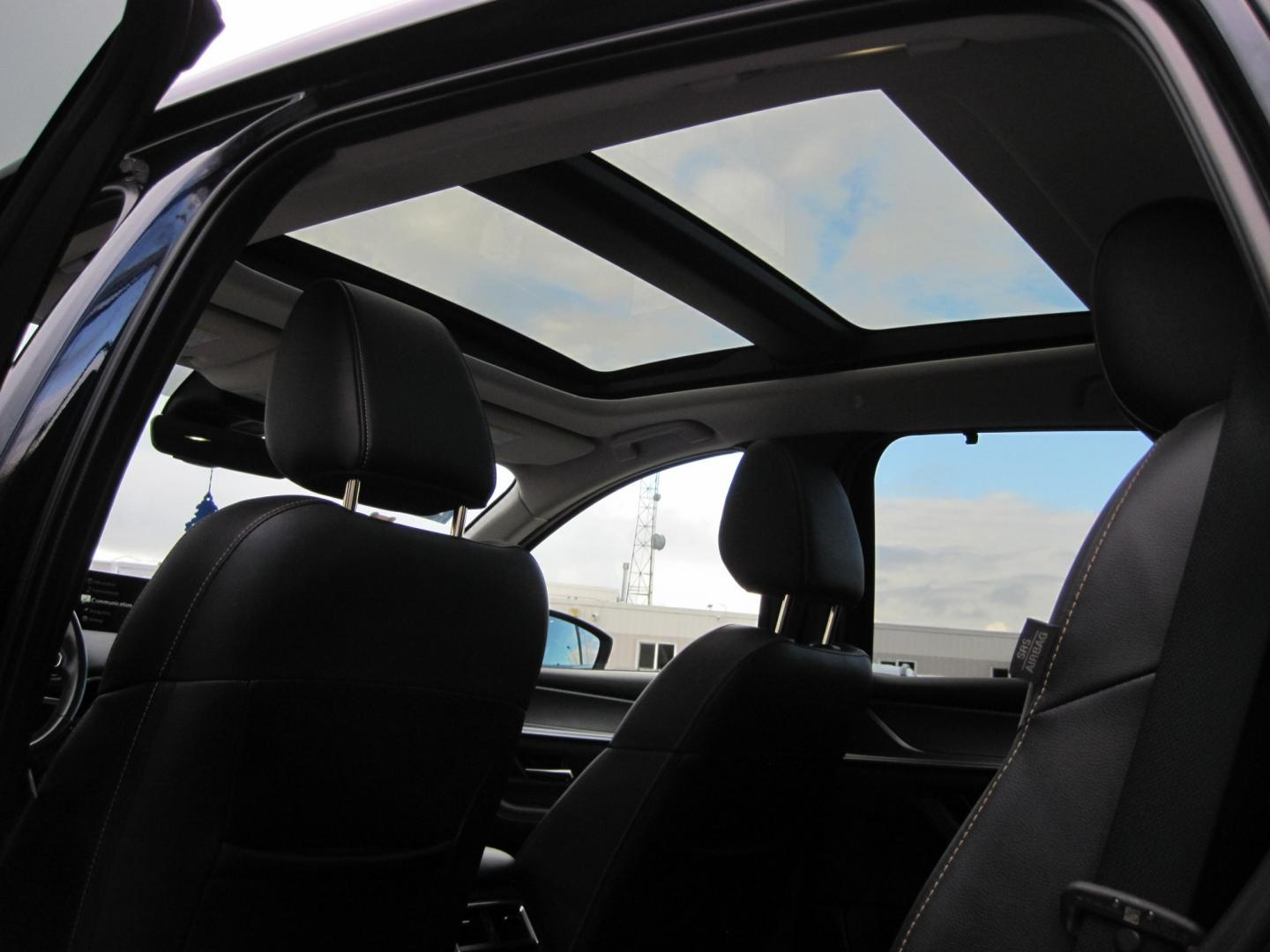 2024 blue /BLACK Mazda CX-90 Premium (JM3KKDHD6R1) with an 3.3L V6 DOHC 24V HYBRID engine, 8A transmission, located at 9530 Old Seward Highway, Anchorage, AK, 99515, (907) 349-3343, 61.134140, -149.865570 - NICE 2024 MAZDA CX-90 PREMIUM AWD COME TAKE A TEST DRIVE- Photo#11